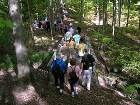 In the photo, hikers are exploring the Bruce Trail, Iroquoia Section. (Postmedia Network files)