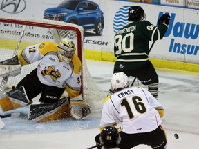 Sarnia Sting goalie Justin Fazio stops a shot from London Knights forward Alex Formenton during the Ontario Hockey League game at Progressive Auto Sales Arena on Wednesday September 21, 2016 in Sarnia, Ont. Formenton, a 17-year-old forward from King City, Ont., made his Knights debut. (Terry Bridge/Sarnia Observer/Postmedia Network)