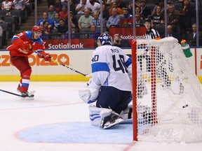 Russia's Evgeni Malkin (left) scores a third period goal against Tuukka Rask of Finland during World Cup of Hockey action at the Air Canada Centre in Toronto on Thursday, Sept. 22, 2016. (Bruce Bennett/Getty Images)