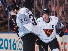 Team North America's Auston Matthews celebrates his goal with teammate Connor McDavid, right, against Sweden during first period World Cup of Hockey action in Toronto, Wednesday September 21, 2016.