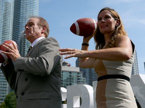 Councillor Norm Kelly and the Grey Cup Festival's Sara Moore on Thursday Sept. 22, 2016. (Dave Abel/Toronto Sun)