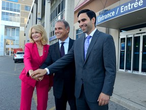 MP Kate Young, left, Via Rail president Yves Desjardins-Siciliano, and MP Peter Fragiskatos announced infrastructure improvements at VIA Rail stations in London and Sarnia on Sept. 12. (MORRIS LAMONT, The London Free Press)