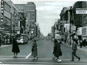Downtown London, shown north at Dundas and Richmond streets in 1964, was crowded with shops and shoppers. (London Free Press file photo)
