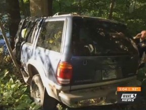 Kevin Bell was trapped in this 1999 Ford Explorer with his dead girlfriend Nikki Reed after he had lost control of the vehicle and it crashed into a tree. (WAVE TV screenshot)