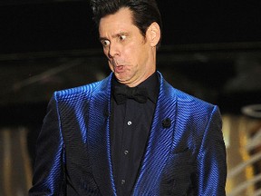 Actor Jim Carrey speaks onstage during the Oscars at the Dolby Theatre on March 2, 2014, in Hollywood, Calif. (Kevin Winter/Getty Images)
