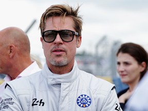 Actor Brad Pitt is seen before the Le Mans 24 Hour race at the Circuit de la Sarthe on June 18, 2016 in Le Mans, France. (Ker Robertson/Getty Images)