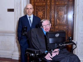DST Global founder Yuri Milner and theoretical physicist Stephen Hawking ahead of a press conference on the Breakthrough Life in the Universe Initiatives, hosted by Yuri Milner and Stephen Hawking, at The Royal Society on July 20, 2015 in London, England. (Stuart C. Wilson/Getty Images for Breakthrough Initiatives)