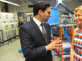 Peter Fragiskatos, MP for London North Centre, speaks with Lambton College president Judith Morris in one of the college technology labs on Friday September 23, 2016 in Sarnia, Ont. Fragiskatos announced federal funding of $5.6 million for a new $11.8-million capital project at the college. Paul Morden/Sarnia Observer/Postmedia Network