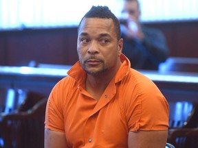 Gregory Green is arraigned in 20th District Court in Dearborn Heights, Mich., on Thursday Sept. 22, 2016. Green is suspected of killing two young children and two teenagers and critically injured his wife at his at his Detroit-area home. (Max Ortiz/The Detroit News via AP)