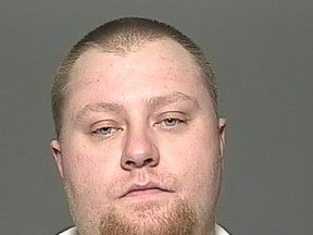 A second suspect, Matthew Adam Bartel, who is 34, is still being sought for allegedly impersonating an undercover cop.