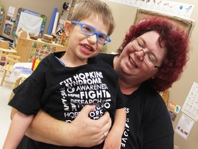 Joseph-Paul Hillis, 3, has Pitts-Hopkins syndrome, a rare genetic condition. His family is speaking out to spread awareness about the disease and to ask for donations. He's pictured with his mom Lisa Nutt at the Ontario Early Years Centre in Forest. (Tyler Kula/Sarnia Observer)