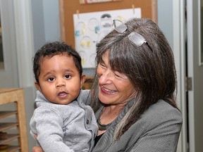 Kingston and the Islands MPP Sophie Kiwala with eight-month-old Makai Anderson, prior to making an announcement at St. Martha Child Care in Kingston on Friday September 23 2016 on adding 100,000 more child care spaces across the province starting in 2017. Ian MacAlpine /The Whig-Standard