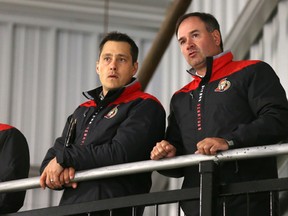 Senators coach Guy Boucher (left) and GM Pierre Dorion. (Jean Levac, Postmedia Network)