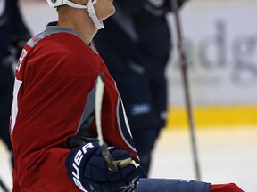 Defenceman Tyler Myers looks up a teammate as the Winnipeg Jets broke training camp at MTS Iceplex in Headingley, Man., on Fri., Sept. 23, 2016.