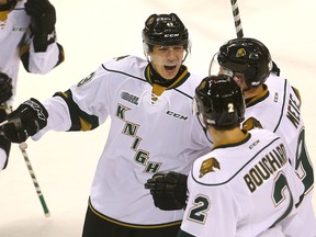 Knights Richard Whittaker celebrates his first OHL goal with Victor Mete and Evan Bouchard as he temporarily puts the Knights up 2-1 during their game at Budweiser Gardens in London, Ont. Photograph taken on Friday September 23, 2016. (MIKE HENSEN, The London Free Press)