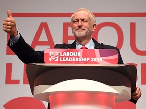 Jeremy Corbyn gives the thumbs up to supporters after being announced as the leader of the Labour Party on the eve of the party's annual conference at the ACC on September 24, 2016 in Liverpool, England. The leadership battle between Jeremy Corbyn and MP for Pontypridd Owen Smith, was triggered by Labour MPs who were unhappy with Mr Corbyn's leadership in the run up to the Brexit referendum. (Photo by Leon Neal/Getty Images)