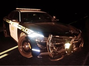 Four police cruisers, including this one, were damaged while pursuing a stolen pickup truck in Elgin County Friday. Four officers were injured during the chase. (OPP supplied photo)