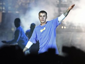 Canadian singer Justin Bieber performs on stage at the AccorHotels Arena in Paris on September 20, 2016. / AFP PHOTO / CHRISTOPHE ARCHAMBAULTCHRISTOPHE ARCHAMBAULT/AFP/Getty Images