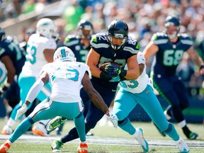 Seahawks tight end Luke Willson (82) brings in a catch against the Dolphins during NFL action at CenturyLink Field in Seattle on Sept. 11, 2016. (Jonathan Ferrey/Getty Images)