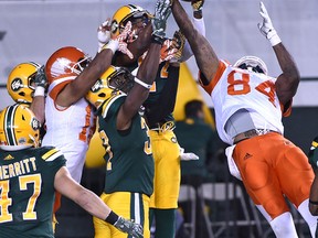 With 3 seconds left the BC Lions try a hail mary pass in the end zone for Emmanuel Arceneaux (84) but got incepted by the Edmonton Eskimos during CFL action at Commonwealth Stadium in Edmonton Friday, September 23, 2016.