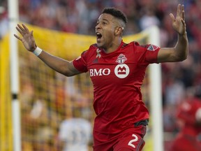 Toronto FC’s Justin Morrow celebrates after scoring his team’s game-tying goal against Philadelphia on Saturday. (THE CANADIAN PRESS)