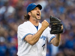 Blue Jays pitcher Jason Grilli celebrates the last out of the eighth inning against the Yankees during MLB action in Toronto on Saturday Sept. 24, 2016. (Mark Blinch/The Canadian Press)
