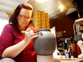 Gino Donato/Sudbury Star
Potter Liz Brownrigg works on a vase in her studio in Sudbury. She is headed to England for a show.
