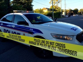 Police blocked off Shillington Avenue near Merivale Road after a man was shot multiple times Sunday morning, Sept. 25, 2016. Ashley Fraser, Postmedia