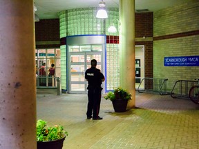 Toronto Police at the scene of a stabbing at Town Centre Court and Borough Drive in Scarborough Saturday, Sept. 24, 2016. (Victor Biro photo)