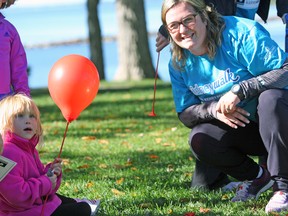 Allie Kauenhofen, 5, and her mother Sandy at the  Kidney Foundation's Kidney Walk at Lake Ontario Park on Sunday morning. (Steph Crosier/The Whig-Standard)
