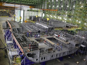 The second keel unit of the first Arctic Offshore Patrol Ship (AOPS) lowered into place alongside the first keel unit at Irving Shipbuildingís Halifax Shipyard.