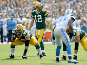 Aaron Rodgers of the Green Bay Packers calls out a play in the first quarter against the Detroit Lions at Lambeau Field on September 25, 2016 in Green Bay, Wisconsin. (Dylan Buell/Getty Images)
