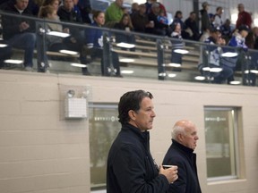Toronto Maple Leafs' president Brendan Shanahan, and general manager, Lou Lamoriello watch a training camp practice at the BMO Centre in Halifax, N.S., on Sunday, Sept. 25, 2016. (THE CANADIAN PRESS/stringer)
