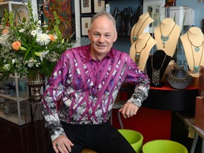 Jim Telfer shows off his sense of style at his London store Splash, a home-decor business located at 57 York St. (MORRIS LAMONT, The London Free Press)