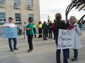 Before the Huron County council meeting the morning of Sept. 21, about 50 people congregated at the steps of the courthouse in hopes protesting may convince council to rethink its July vote to end its ACP program. (Darryl Coote/The Goderich Signal Star)