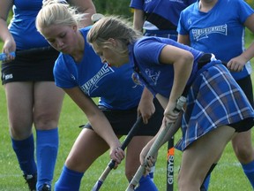 Makayla Meinen of the MDHS field hockey team battles for the ball against Goderich in Huron-Perth action Sept. 21. SUBMITTED