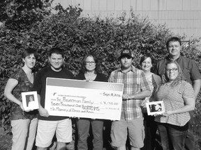 The Beuermans went to London Ont. to donate all the money they collected from a BBQ held last August.(Submitted photo)