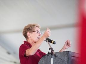 Premier Kathleen Wynne speaks at the opening ceremonies of International Plowing Match in Harriston September 20, 2016. (THE CANADIAN PRESS/Hannah Yoon)