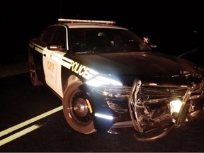 Four police cruisers, including this one, were damaged while pursuing a stolen pickup truck in Elgin County Friday. Four officers were injured during the chase. (OPP supplied photo)