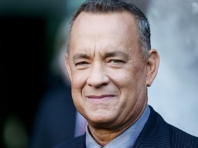 FILE - In this Sept. 8, 2016 file photo, Tom Hanks arrives at the premiere of "Sully" in Los Angeles. (Rich Fury/Invision/AP, File)