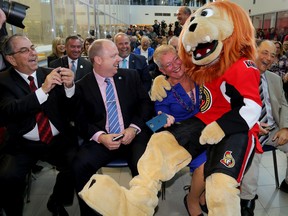 Belleville city councillor Jackie Denyes meets the Ottawa Senators mascot, Sparty, during an event where it was announced the Ottawa Senators are relocating their AHL team to Belleville where they will become the Belleville Senators, at the Quinte Sports and Wellness Centre, Monday September 26, 2016 in Belleville, Ont. 

Emily Mountney-Lessard/Belleville Intelligencer/Postmedia Network