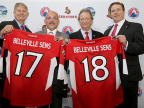 From left, Belleville's director of recreation, culture and community cervices Mark Fluhrer, Mayor Taso Christopher, Senators owner Eugene Melnyk and Senators assistant general manager Randy Lee photo pose for a photo following a press conference. 
The conference was held to was announced the Ottawa Senators are relocating their AHL team to Belleville where they will become the Belleville Senators, at the Quinte Sports and Wellness Centre, Monday September 26, 2016 in Belleville, Ont. 

Emily Mountney-Lessard/Belleville Intelligencer/Postmedia Network