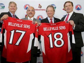 Emily Mountney-Lessard/The Intelligencer
From left, Belleville's director of recreation, culture and community cervices Mark Fluhrer, Mayor Taso Christopher, Senators owner Eugene Melnyk and Senators assistant general manager Randy Lee photo pose for a photo following a press conference. The conference was held to was announced the Ottawa Senators are relocating their AHL team to Belleville where they will become the Belleville Senators.