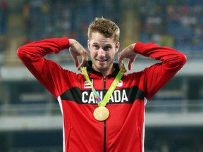 Derek Drouin won an award at the Athletics Ontario gala and hall of fame induction this past weekend in the senior male jumps category. The 26-year-old Corunna native won gold in men's high jump at the Rio Olympics. (Jean Levac/Sarnia Observer/Postmedia Network)