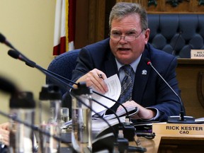 Tim Miller/The Intelligencer
City of Belleville CAO Rick Kester responds to concerns over a jump in price of the winning bidder on the building of a new police station during a council meeting on Monday in Belleville.