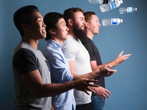 Western University engineering students Justin Lam, left, Danny Loo, Armin Gurdic, and Aidan Sabourin have developed a popular app called Bottle Flip 2k16. Much to their surprise, the app has been downloaded three million times and has shot to the top of the iTunes game apps in Canada and the United States. (DEREK RUTTAN, The London Free Press)