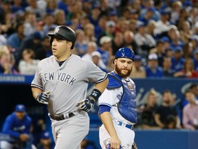 Yankees' Mark Teixeira launched an epic bat flip after hitting a home run against the Blue Jays last night at the Roger Centre. (Stan Behal/Toronto Sun)