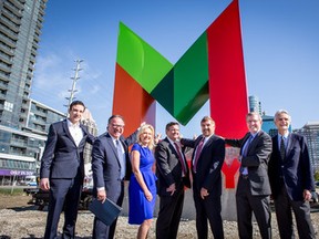 The unveiling of a new real estate project in Mississauga on Sept. 27, 2016. (Left to right) Mississauga Councillors John Kovac, Nando Iannicca, Mayor Bonnie Crombie, Edward Rogers, Mississauga planning commissioner Edward Sajecki,; Urban Capital partners Mark Reeve, Donald Clinton and Cooper Robertson. (Supplied photo/CNW Group/Rogers Real Estate Development Limited)