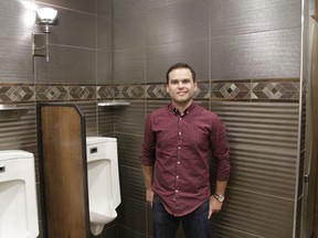 Whitecourt Esso Super Station owner and president Landon Hommy stands inside the men’s restroom at the station. The station’s restroom is competing to be declared the best restroom in the country.