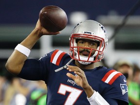 Patriots quarterback Jacoby Brissett (pictured) has an injured thumb while Jimmy Garoppolo is dealing with a shoulder injury as the team prepares for Sunday's game against the Bills. (Elise Amendola/AP Photo)